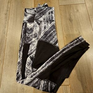 Lululemon black and white leggings with mesh siding